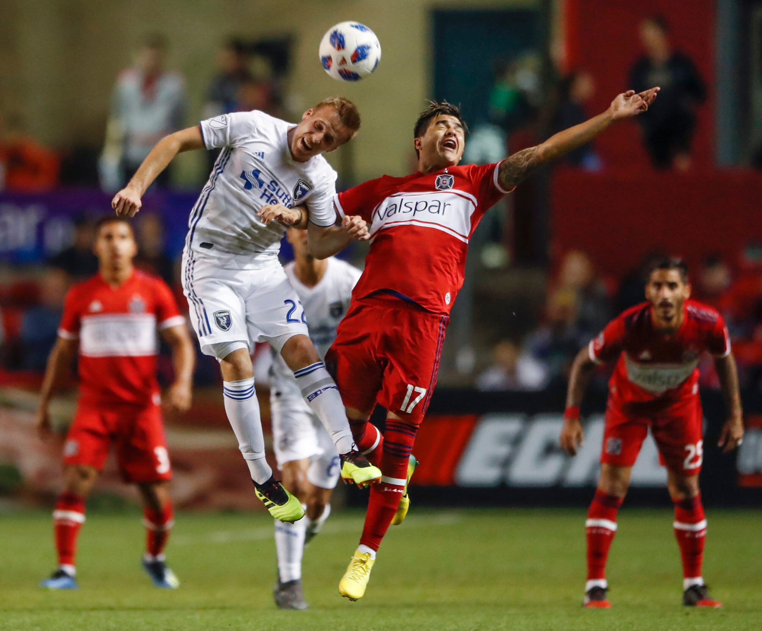 Jun 2, 2018; Chicago, IL, USA; San Jose Earthquakes forward Tommy Thompson (22) goes for a header against Chicago Fire forward Diego Campos (17) during the second half at Bridgeview Stadium. Mandatory Credit: Kamil Krzaczynski-Imagn Images