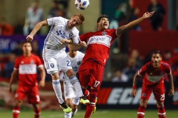 Jun 2, 2018; Chicago, IL, USA; San Jose Earthquakes forward Tommy Thompson (22) goes for a header against Chicago Fire forward Diego Campos (17) during the second half at Bridgeview Stadium. Mandatory Credit: Kamil Krzaczynski-Imagn Images