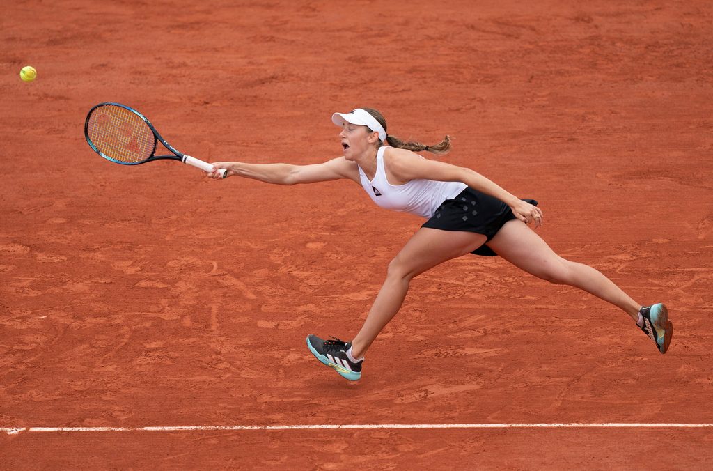 May 26, 2022; Paris, France; Kaja Juvan (SLO) returns a shot from Paula Badosa (ESP) during a match on day five of the French Open at Stade Roland-Garros. Mandatory Credit: Susan Mullane-Imagn Images