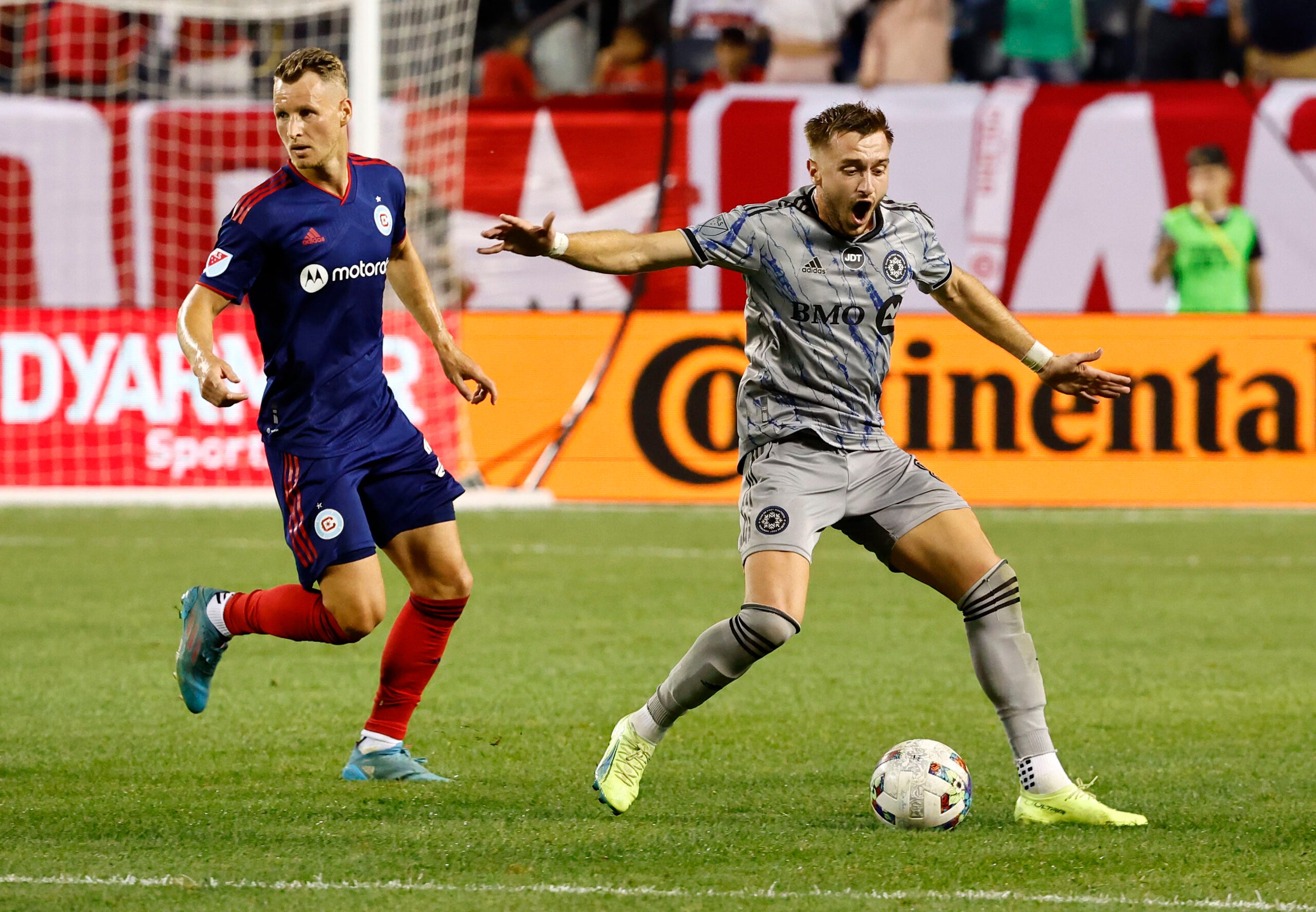 Aug 27, 2022; Chicago, Illinois, USA; CF Montreal midfielder Djordje Mihailovic (8) reacts after a foul against the Chicago Fire during the second half at Soldier Field. Mandatory Credit: Mike Dinovo-Imagn Images