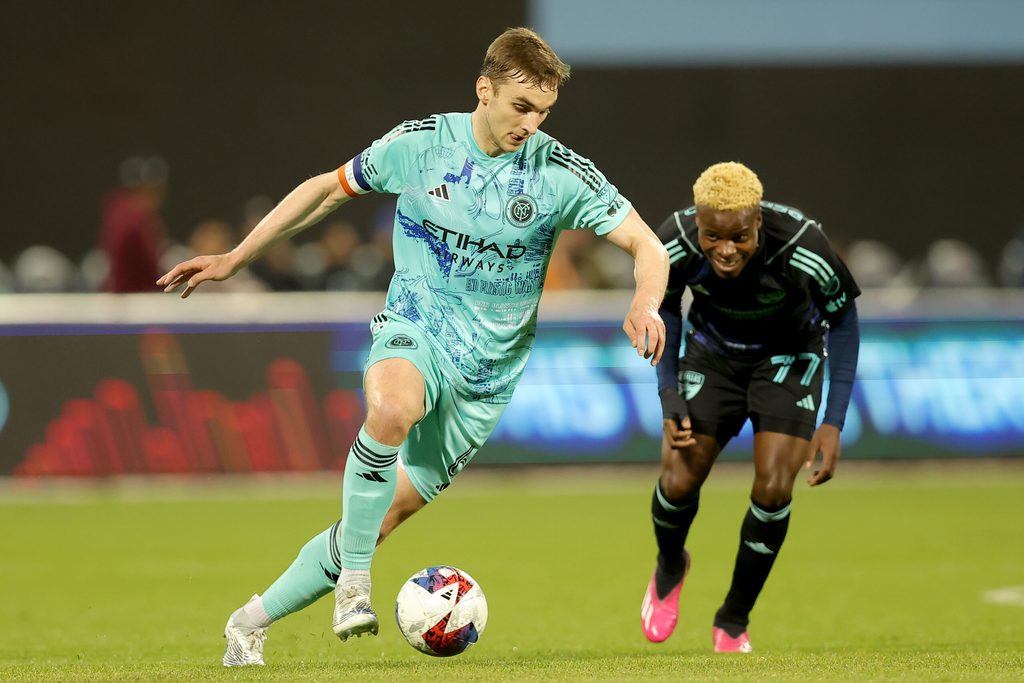 Apr 22, 2023; Flushing, NY, USA; New York City FC midfielder James Sands (6) controls the ball against FC Dallas forward Bernard Kamungo (77) during the second half at Citi Field. Mandatory Credit: Brad Penner-Imagn Images