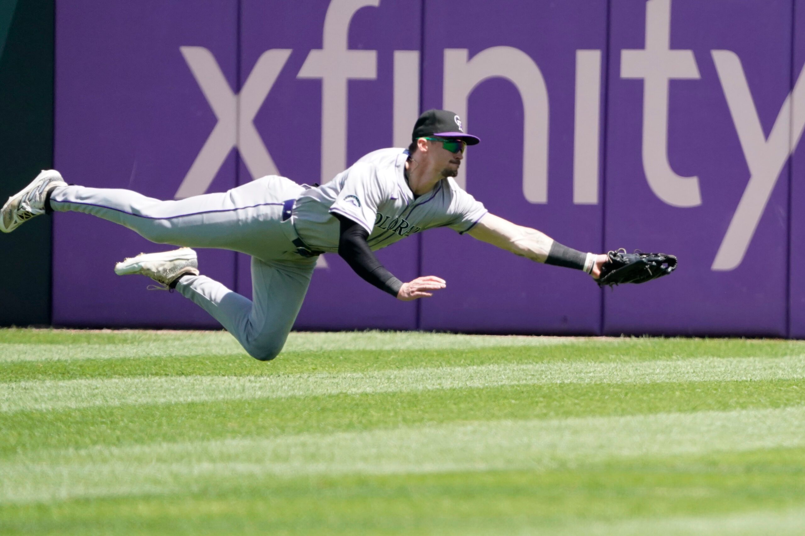 Jun 30, 2024; Chicago, Illinois, USA; Colorado Rockies outfielder Brenton Doyle (9) makes a catch against Chicago White Sox outfielder Luis Robert Jr. (not pictured) during the sixth inning at Guaranteed Rate Field. Mandatory Credit: David Banks-Imagn Images