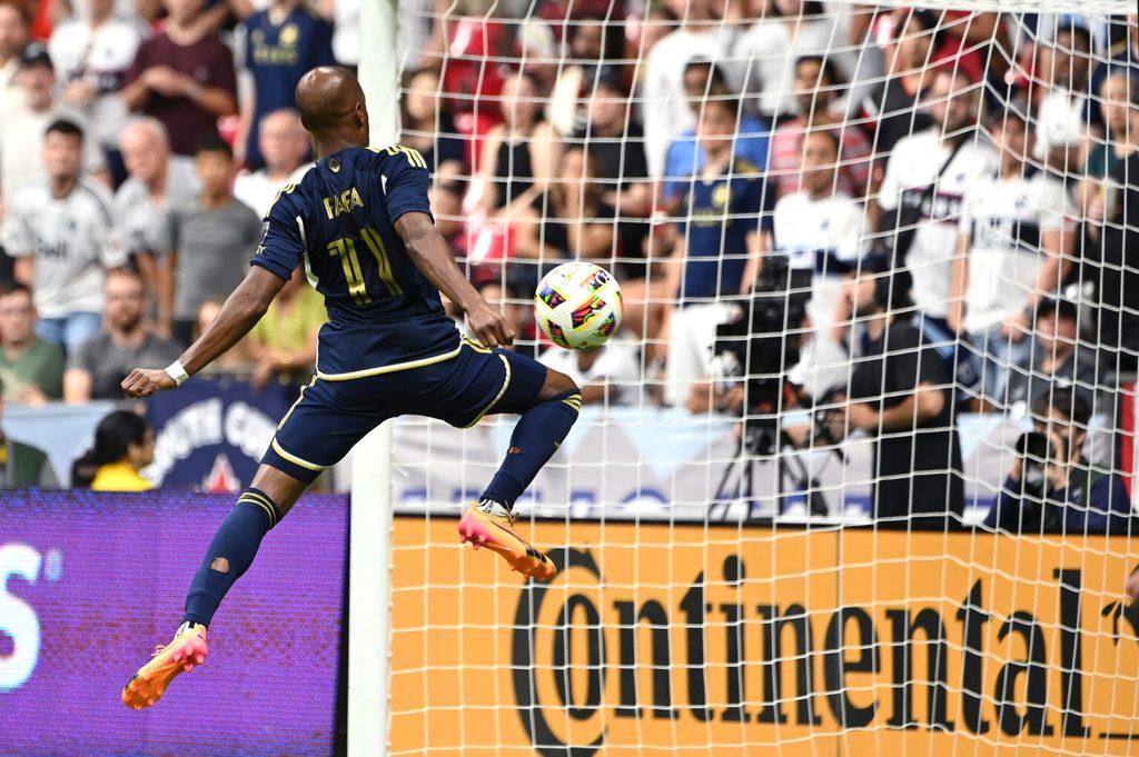 Jul 17, 2024; Vancouver, British Columbia, CAN; Vancouver Whitecaps FC forward Fafa Picault (11) scores goal against Sporting Kansas City during the second half at BC Place. Mandatory Credit: Simon Fearn-Imagn Images