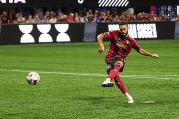 Jul 26, 2024; Atlanta, Georgia, USA; Atlanta United defender Derrick Williams (3) scores a goal against D.C. United during penalty kicks at Mercedes-Benz Stadium. Mandatory Credit: Dale Zanine-Imagn Images