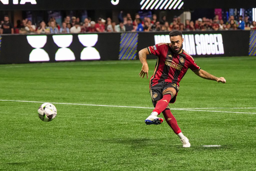Jul 26, 2024; Atlanta, Georgia, USA; Atlanta United defender Derrick Williams (3) scores a goal against D.C. United during penalty kicks at Mercedes-Benz Stadium. Mandatory Credit: Dale Zanine-Imagn Images
