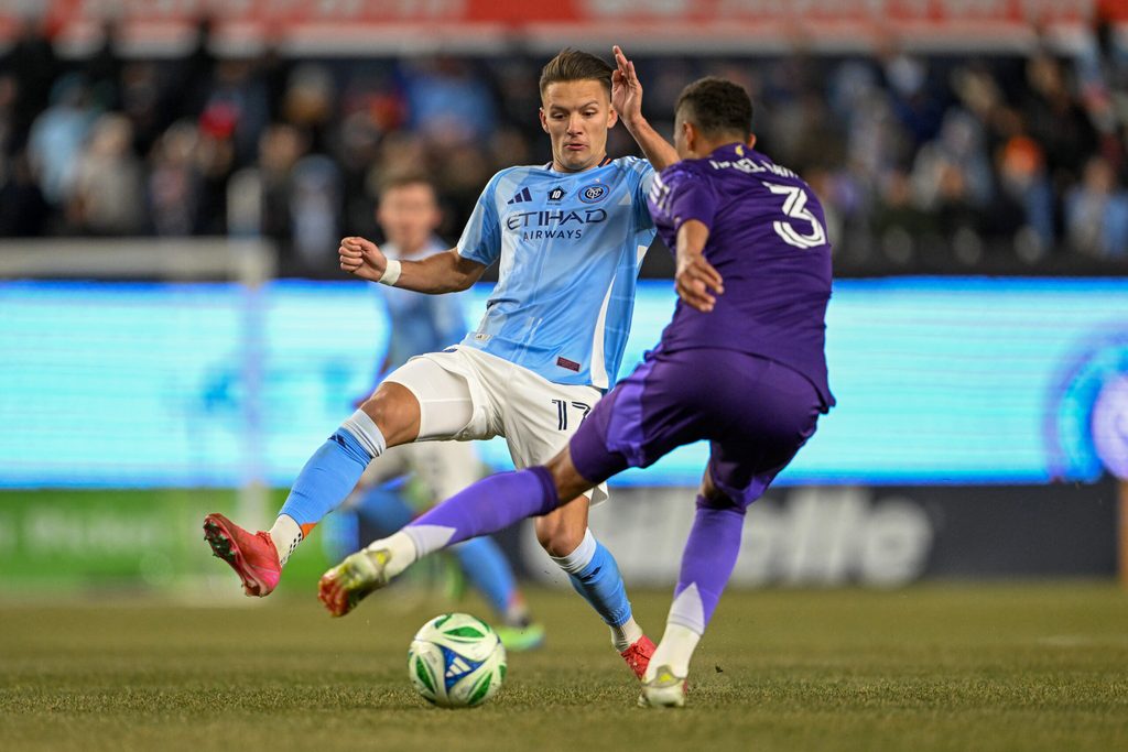 Mar 8, 2025; New York, New York, USA; New York City FC midfielder Hannes Wolf (17) defends the ball against Orlando City defender Rafael Santos (3) during the second half at Yankee Stadium. Mandatory Credit: Mark Smith-Imagn Images