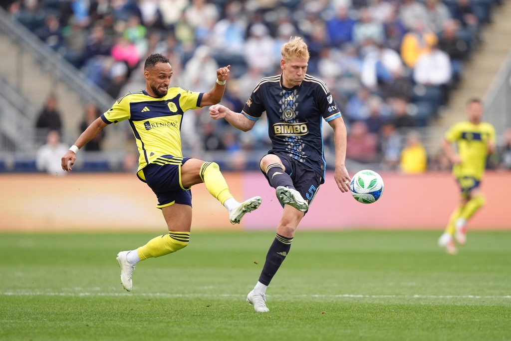 Mar 16, 2025; Chester, Pennsylvania, USA; Nashville SC forward Hany Mukhtar (10) and Philadelphia Union defender Jakob Glesnes (5) battle for the ball in the second half at Subaru Park. Mandatory Credit: Kyle Ross-Imagn Images