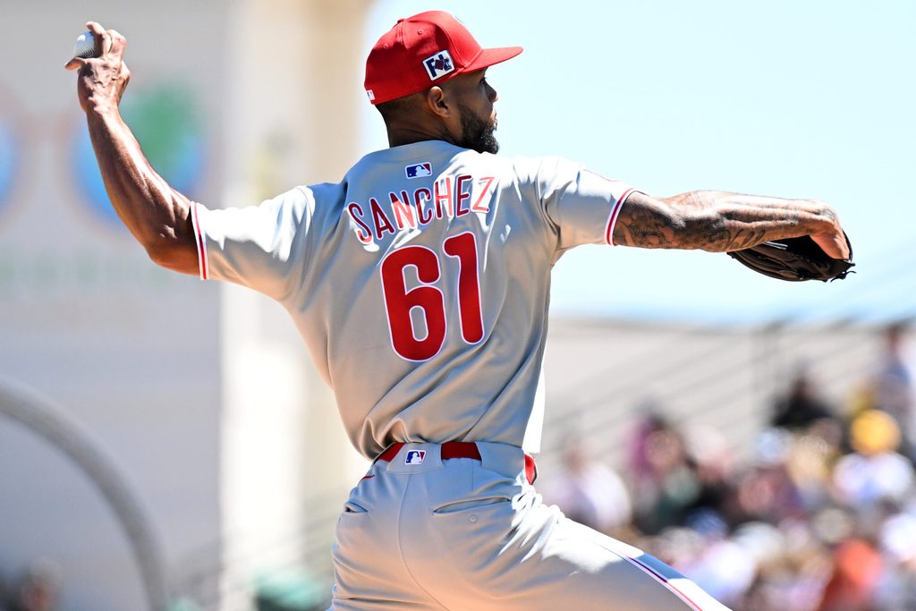 Mar 18, 2025; Bradenton, Florida, USA; Philadelphia Phillies starting pitcher Christopher Sanchez (61) throws a pitch in the first inning against the Pittsburgh Pirates during spring training at LECOM Park. Mandatory Credit: Jonathan Dyer-Imagn Images