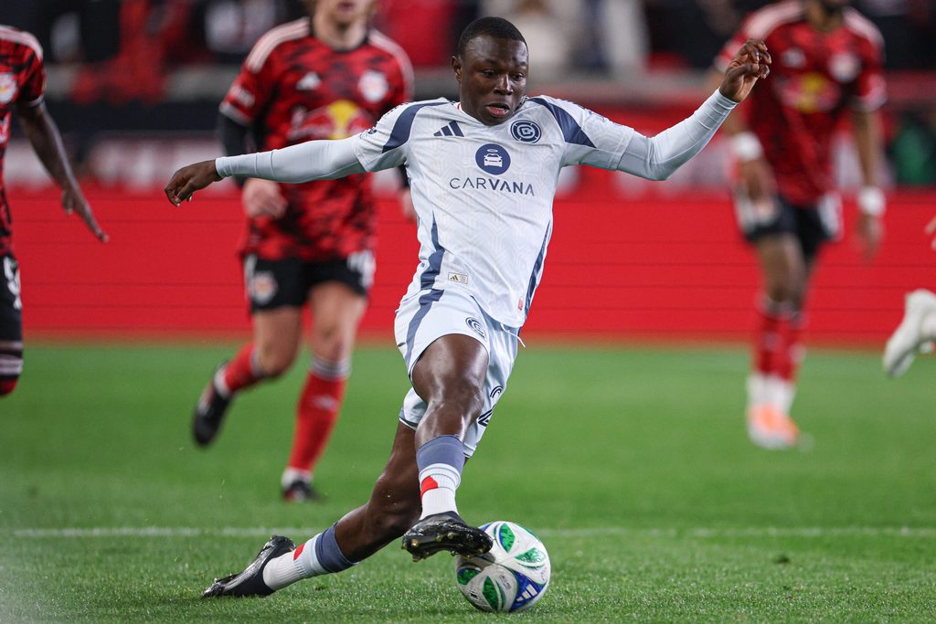 Apr 5, 2025; Harrison, New Jersey, USA; Chicago Fire FC midfielder Omari Glasgow (26) plays the ball against the New York Red Bulls during the second half at Sports Illustrated Stadium. Mandatory Credit: Vincent Carchietta-Imagn Images