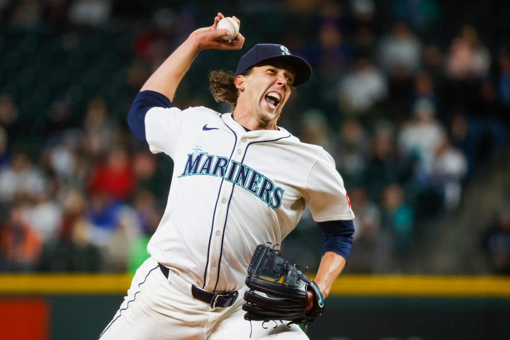 Apr 7, 2025; Seattle, Washington, USA; Seattle Mariners starting pitcher Logan Gilbert (36) throws against the Houston Astros during the fifth inning at T-Mobile Park. Mandatory Credit: Joe Nicholson-Imagn Images
