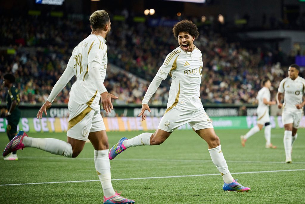 Apr 19, 2025; Portland, Oregon, USA; Los Angeles FC forward David Martinez (30) celebrates with Los Angeles FC forward Denis Bouanga (99) after scoring a goal during the second half against the Portland Timbers at Providence Park. Mandatory Credit: Troy Wayrynen-Imagn Images