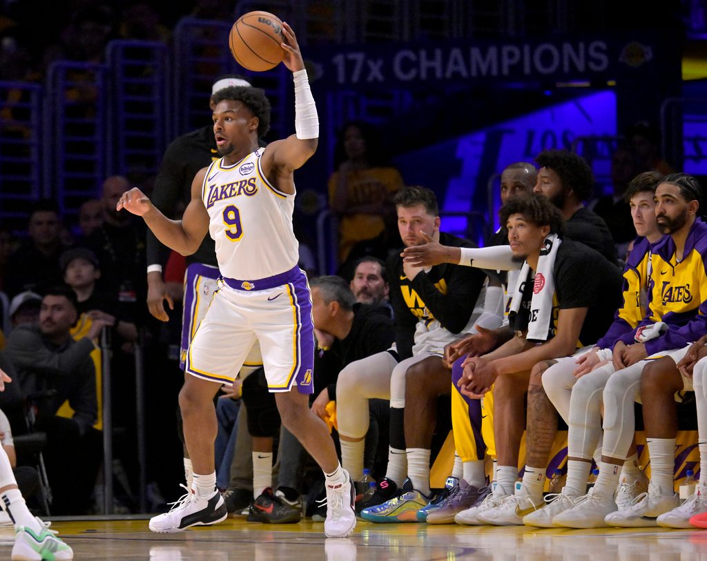 Apr 19, 2025; Los Angeles, California, USA; Los Angeles Lakers guard Bronny James (9) looks to take a shot in the second half against the Minnesota Timberwolves at Crypto.com Arena. Mandatory Credit: Jayne Kamin-Oncea-Imagn Images