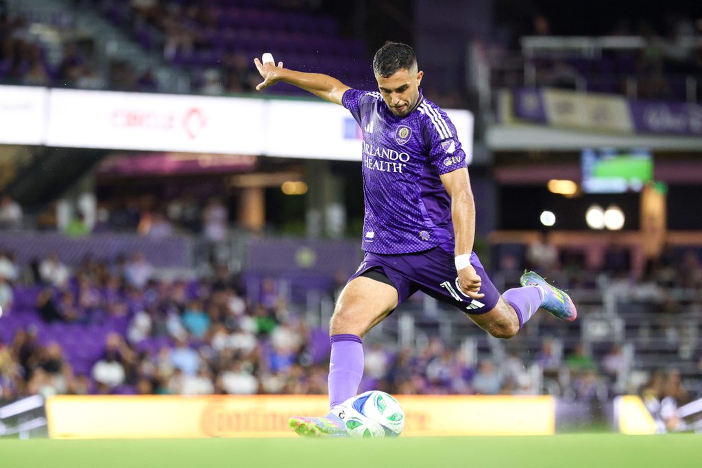 May 14, 2025; Orlando, Florida, USA; Orlando City midfielder Martin Ojeda (10) takes a free kick against Charlotte FC in the second half at Inter&Co Stadium. Mandatory Credit: Nathan Ray Seebeck-Imagn Images