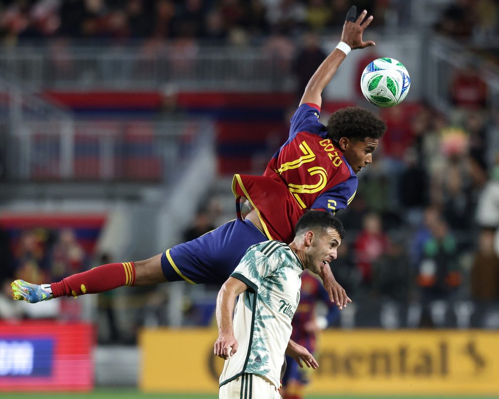 May 14, 2025; Sandy, Utah, USA; Real Salt Lake forward Zavier Gozo (72) and Portland Timbers midfielder Cristhian Paredes (17) battle for the ball during the second half at America First Field. Mandatory Credit: Rob Gray-Imagn Images