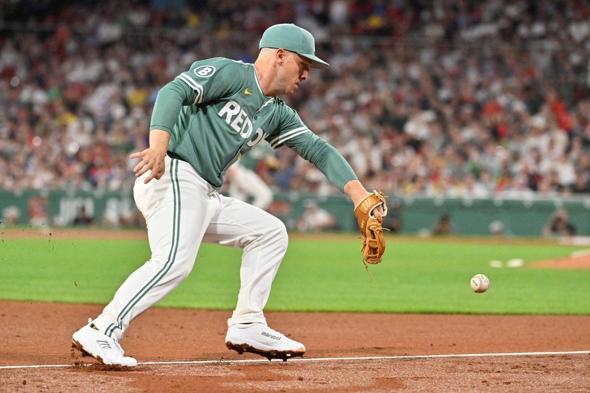 May 16, 2025; Boston, Massachusetts, USA; Boston Red Sox third baseman Alex Bregman (2) makes an error at third during the seventh inning against the Atlanta Braves at Fenway Park. Mandatory Credit: Eric Canha-Imagn Images
