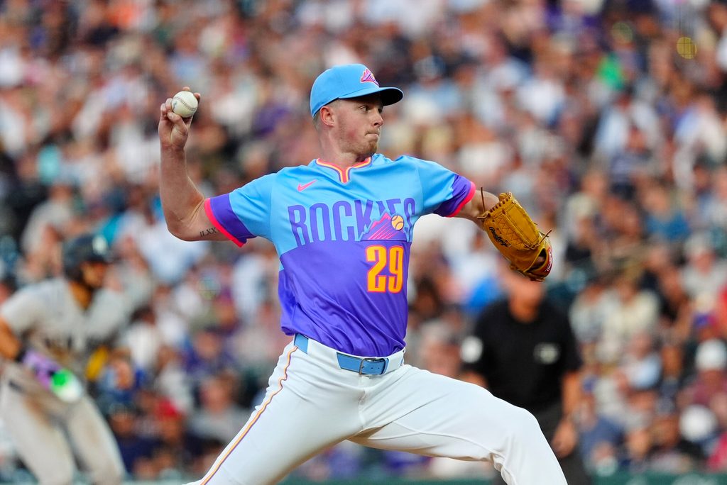 May 23, 2025; Denver, Colorado, USA; Colorado Rockies starting pitcher Tanner Gordon (29) delivers a pitch in the fourth inning against the New York Yankees at Coors Field. Mandatory Credit: Ron Chenoy-Imagn Images