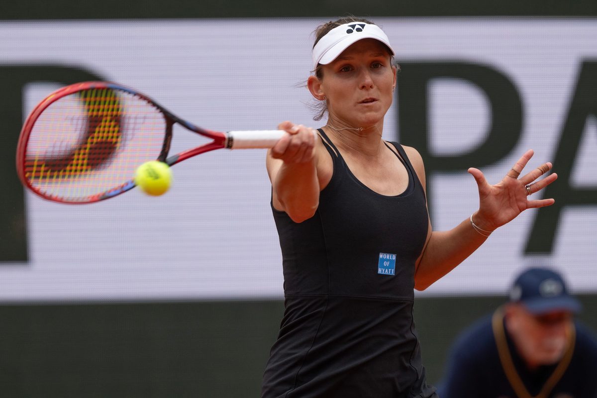 May 27, 2025; Paris, FR; Varvara Gracheva of France returns a shot during her match against Sofia Kenin of the United States on day three at Roland Garros Stadium. Mandatory Credit: Susan Mullane-Imagn Images