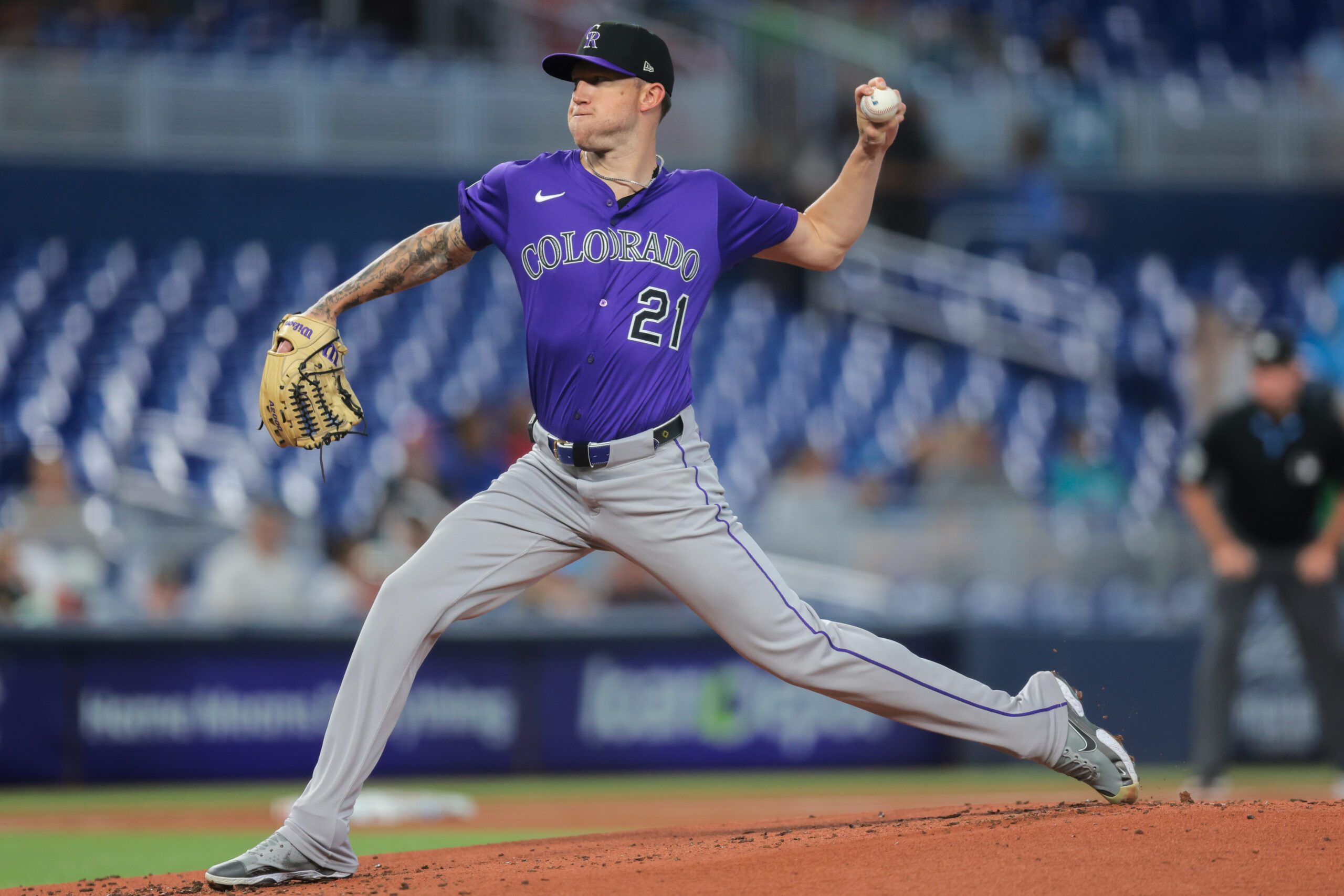 Jun 4, 2025; Miami, Florida, USA; Colorado Rockies starting pitcher Kyle Freeland (21) delivers a pitch against the Miami Marlins during the first inning at loanDepot Park. Mandatory Credit: Sam Navarro-Imagn Images