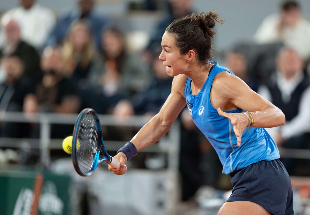 Jun 5, 2025; Paris, FR; Lois Boisson of France returns a shot during her match against Coco Gauff of the United States on day 12 at Roland Garros Stadium. Mandatory Credit: Susan Mullane-Imagn Images