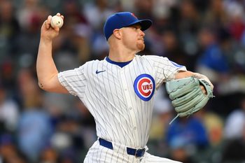 May 27, 2025; Chicago, Illinois, USA; Chicago Cubs starting pitcher Cade Horton (22) pitches during a game against the Colorado Rockies at Wrigley Field. Mandatory Credit: Patrick Gorski-Imagn Images