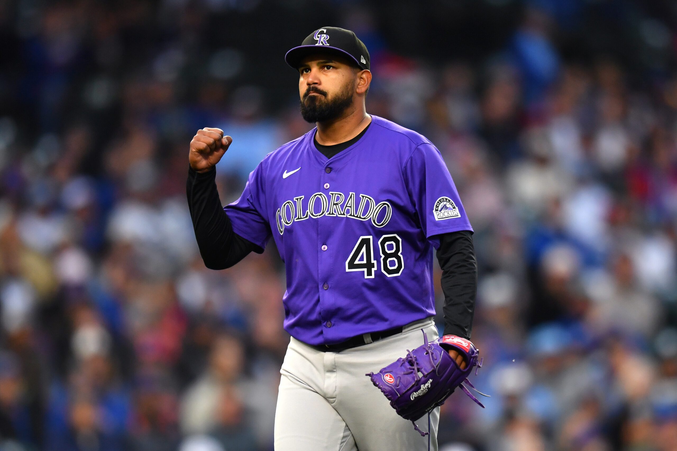 May 27, 2025; Chicago, Illinois, USA; Colorado Rockies starting pitcher German Marquez (48) celebrates after ending the second inning against the Chicago Cubs at Wrigley Field. Mandatory Credit: Patrick Gorski-Imagn Images