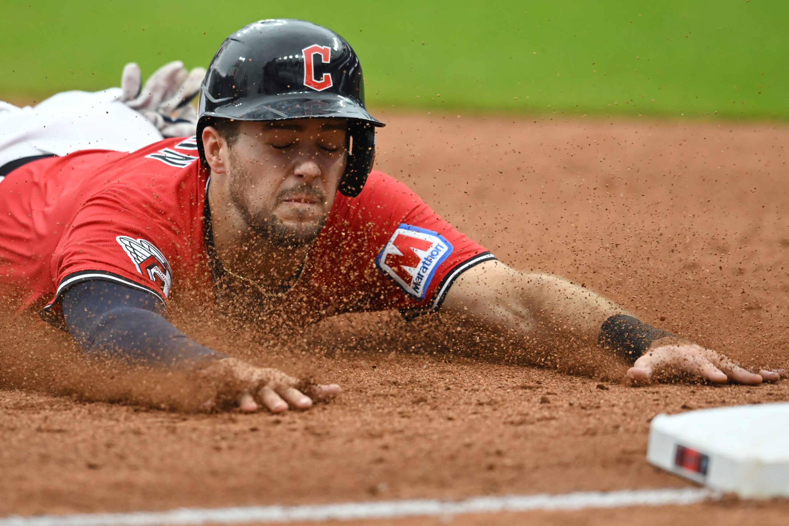 Jun 8, 2025; Cleveland, Ohio, USA; Cleveland Guardians second baseman Will Wilson (7) steals third base during the seventh inning against the Houston Astros at Progressive Field. Mandatory Credit: Ken Blaze-Imagn Images