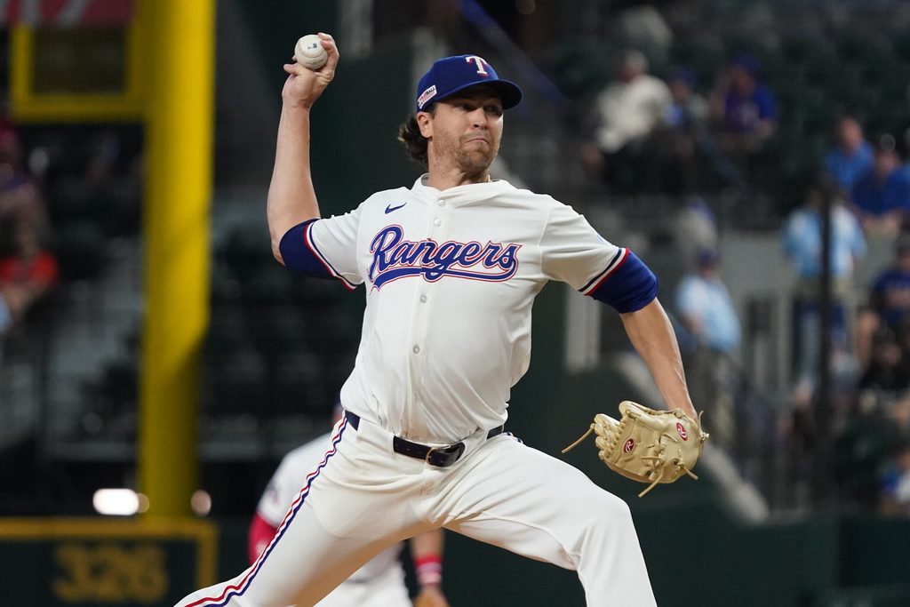 Jun 14, 2025; Arlington, Texas, USA; Texas Rangers pitcher Jacob deGrom (48) throws to the plate during the first inning against the Chicago White Sox at Globe Life Field. Mandatory Credit: Raymond Carlin III-Imagn Images