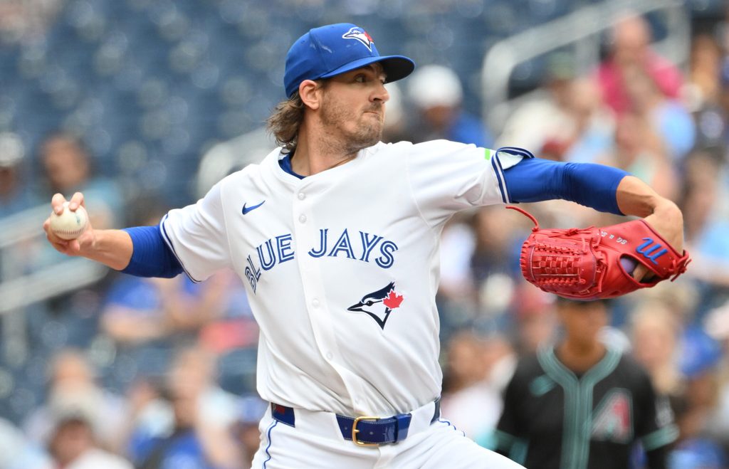 Jun 19, 2025; Toronto, Ontario, CAN; Toronto Blue Jays starting pitcher Kevin Gausman (34) delivers a pitch against the Arizona Diamondbacks in the first inning at Rogers Centre. Mandatory Credit: Dan Hamilton-Imagn Images
