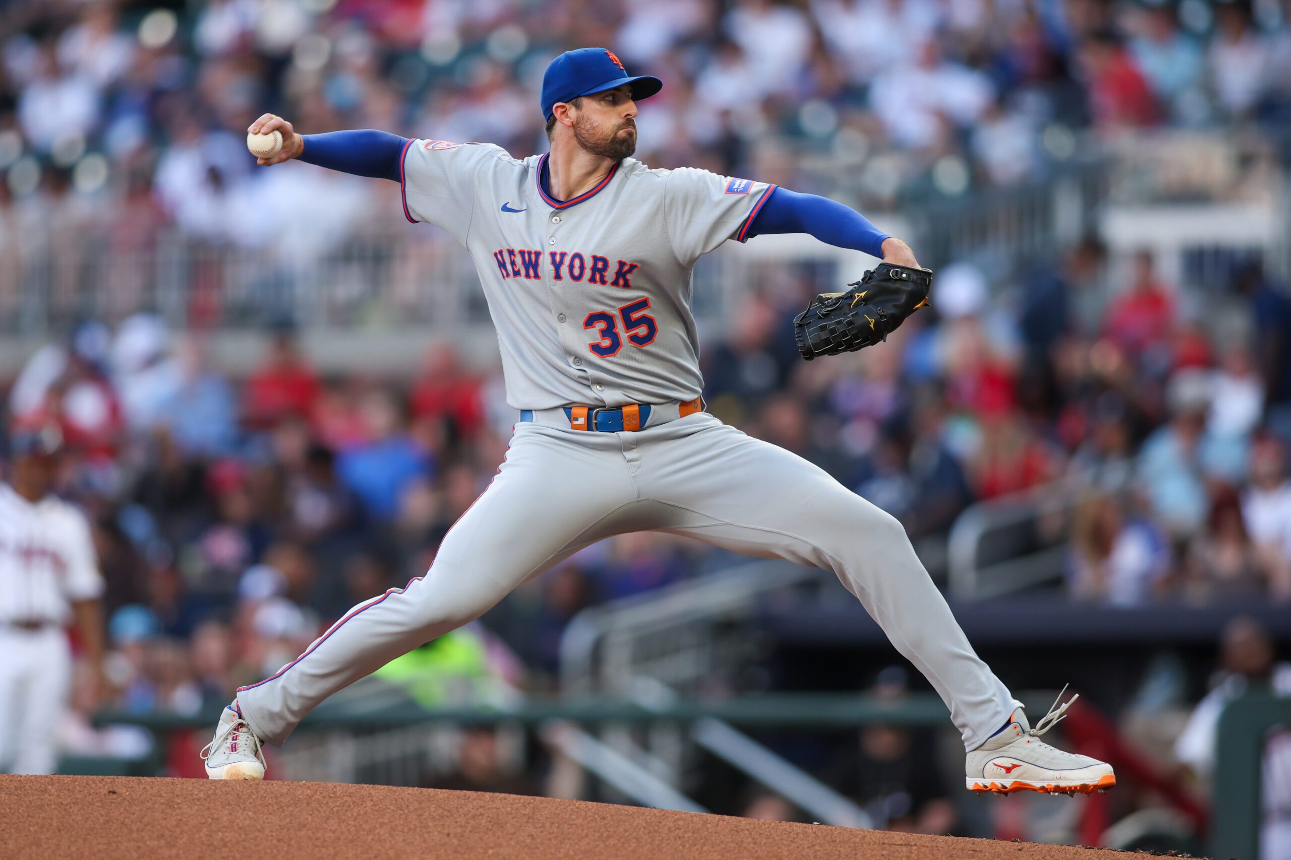Jun 19, 2025; Atlanta, Georgia, USA; New York Mets starting pitcher Clay Holmes (35) throws against the Atlanta Braves in the first inning at Truist Park. Mandatory Credit: Brett Davis-Imagn Images