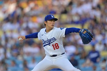 Jun 19, 2025; Los Angeles, California, USA;  Los Angeles Dodgers pitcher Yoshinobu Yamamoto (18) delivers a pitch during the first inning against the San Diego Padres at Dodger Stadium. Mandatory Credit: Jayne Kamin-Oncea-Imagn Images