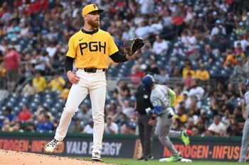 Jun 11, 2025; Pittsburgh, Pennsylvania, USA; Pittsburgh Pirates sarting pitcher Mike Burrows gets a new baseball after Texas Rangers Adolis Garcia hit a home run during the fourth inning at PNC Park. Mandatory Credit: Philip G. Pavely-Imagn Images