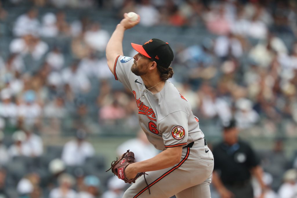 Jun 22, 2025; Bronx, New York, USA; Baltimore Orioles starting pitcher Dean Kremer (64) delivers a pitch during the first inning against the New York Yankees at Yankee Stadium. Mandatory Credit: Vincent Carchietta-Imagn Images