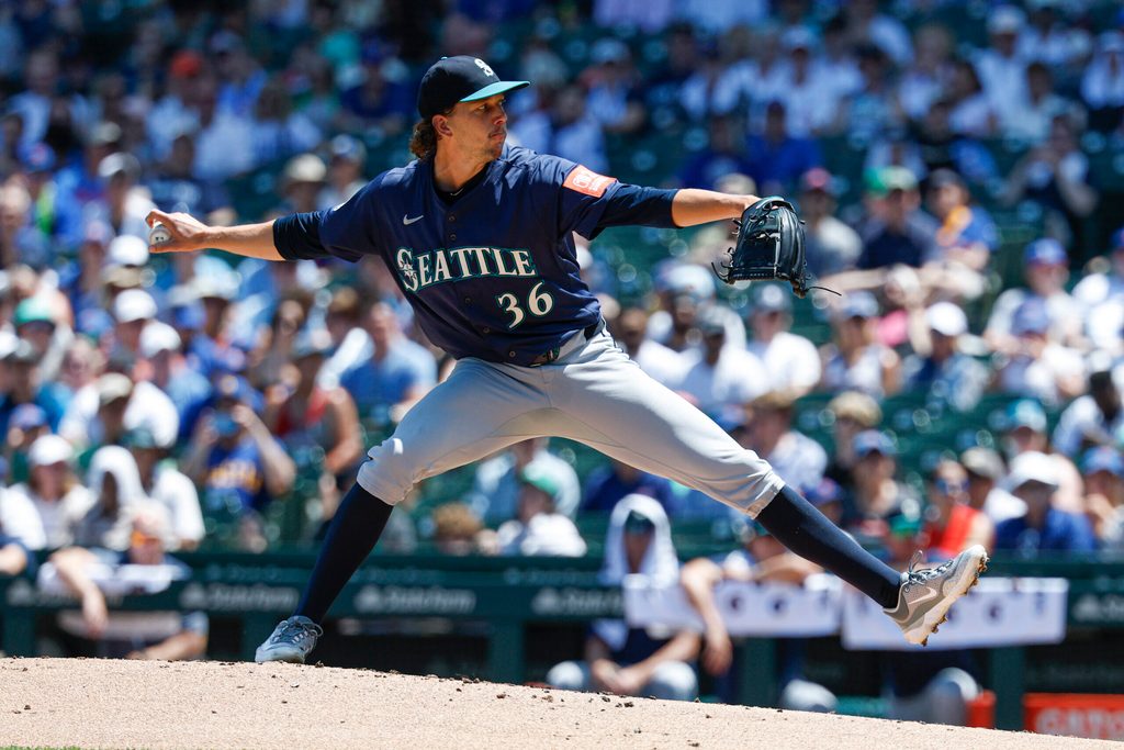 Jun 22, 2025; Chicago, Illinois, USA; Seattle Mariners starting pitcher Logan Gilbert (36) delivers a pitch against the Chicago Cubs during the first inning at Wrigley Field. Mandatory Credit: Kamil Krzaczynski-Imagn Images