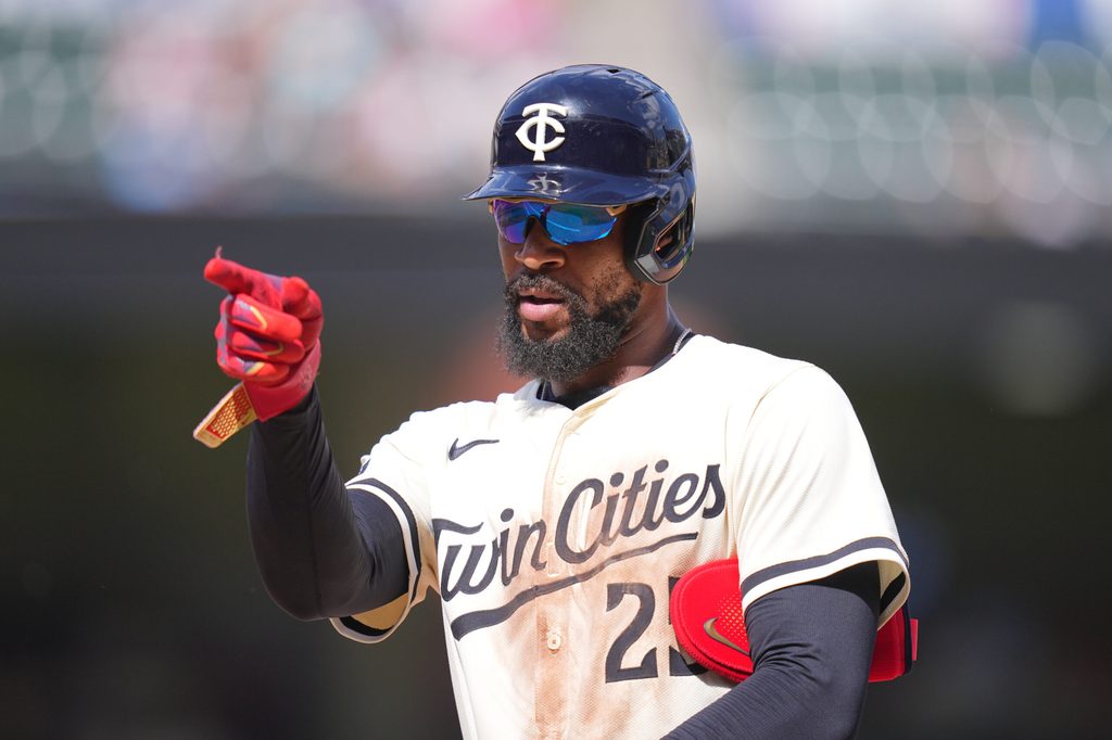 Jun 22, 2025; Minneapolis, Minnesota, USA; Minnesota Twins outfielder Byron Buxton (25) points to the dugout against the Milwaukee Brewers in the ninth inning at Target Field. Mandatory Credit: Brad Rempel-Imagn Images