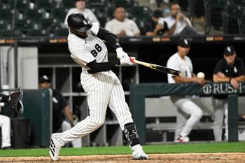 Jun 23, 2025; Chicago, Illinois, USA;  Chicago White Sox outfielder Luis Robert Jr. (88) hits a single during the ninth inning against the Arizona Diamondbacks at Rate Field. Mandatory Credit: Matt Marton-Imagn Images