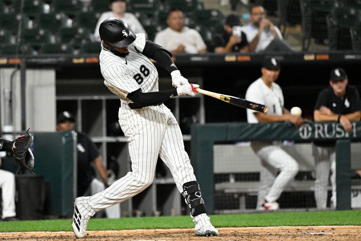 Jun 23, 2025; Chicago, Illinois, USA; Chicago White Sox outfielder Luis Robert Jr. (88) hits a single during the ninth inning against the Arizona Diamondbacks at Rate Field. Mandatory Credit: Matt Marton-Imagn Images