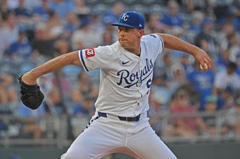 Jun 24, 2025; Kansas City, Missouri, USA;  Kansas City Royals starting pitcher Kris Bubic (50) throws a pitch in the first inning against the Tampa Bay Rays at Kauffman Stadium. Mandatory Credit: Peter Aiken-Imagn Images