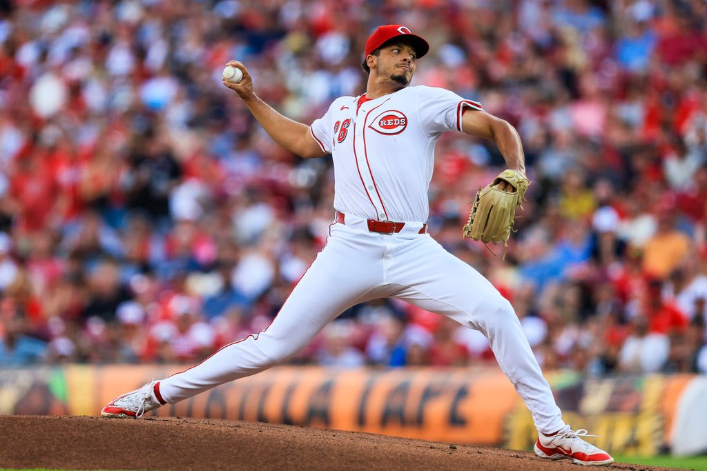 Jun 24, 2025; Cincinnati, Ohio, USA; Cincinnati Reds starting pitcher Chase Burns (26) pitches against the New York Yankees in the first inning at Great American Ball Park. Mandatory Credit: Katie Stratman-Imagn Images
