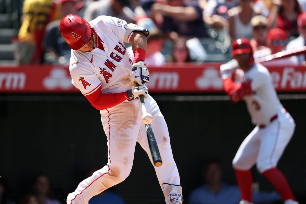 Jun 25, 2025; Anaheim, California, USA; Los Angeles Angels designated hitter Mike Trout (27) hits an RBI single during the sixth inning against the Boston Red Sox at Angel Stadium. Mandatory Credit: Kiyoshi Mio-Imagn Images