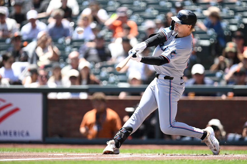 Jun 26, 2025; San Francisco, California, USA; Miami Marlins left fielder Kyle Stowers (28) hits a three-run home run against the San Francisco Giants in the first inning at Oracle Park. Mandatory Credit: Eakin Howard-Imagn Images