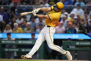 Jun 27, 2025; Pittsburgh, Pennsylvania, USA;  Pittsburgh Pirates right fielder Bryan Reynolds (10) hits a three run home run against the New York Mets during the sixth inning at PNC Park. Mandatory Credit: Charles LeClaire-Imagn Images