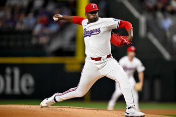 Jun 28, 2025; Arlington, Texas, USA; Texas Rangers starting pitcher Kumar Rocker (80) pitches against the Seattle Mariners during the first inning at Globe Life Field. Mandatory Credit: Jerome Miron-Imagn Images