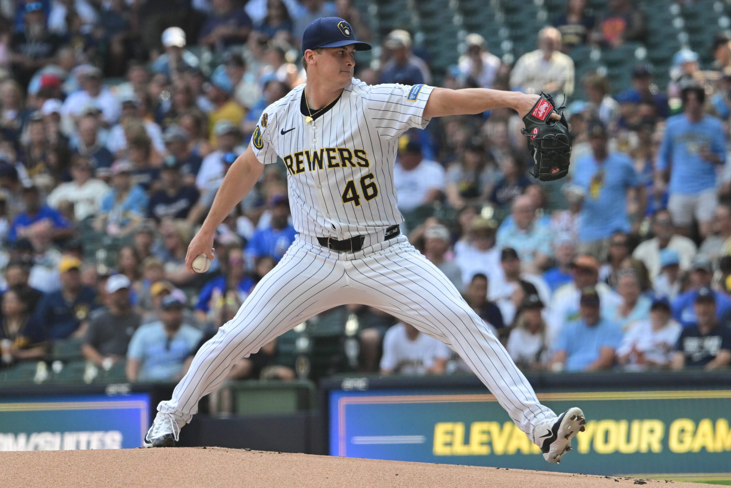 Jun 28, 2025; Milwaukee, Wisconsin, USA; Milwaukee Brewers starting pitcher Quinn Priester (46) throws a pitch in the first inning against the Colorado Rockies at American Family Field. Mandatory Credit: Benny Sieu-Imagn Images