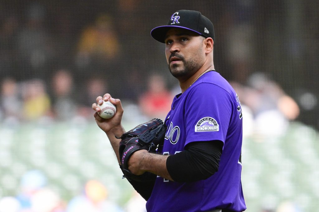 Jun 28, 2025; Milwaukee, Wisconsin, USA; Colorado Rockies starting pitcher Antonio Senzatela (49) looks on before a pitching change in the fifth inning against the Milwaukee Brewers at American Family Field. Mandatory Credit: Benny Sieu-Imagn Images