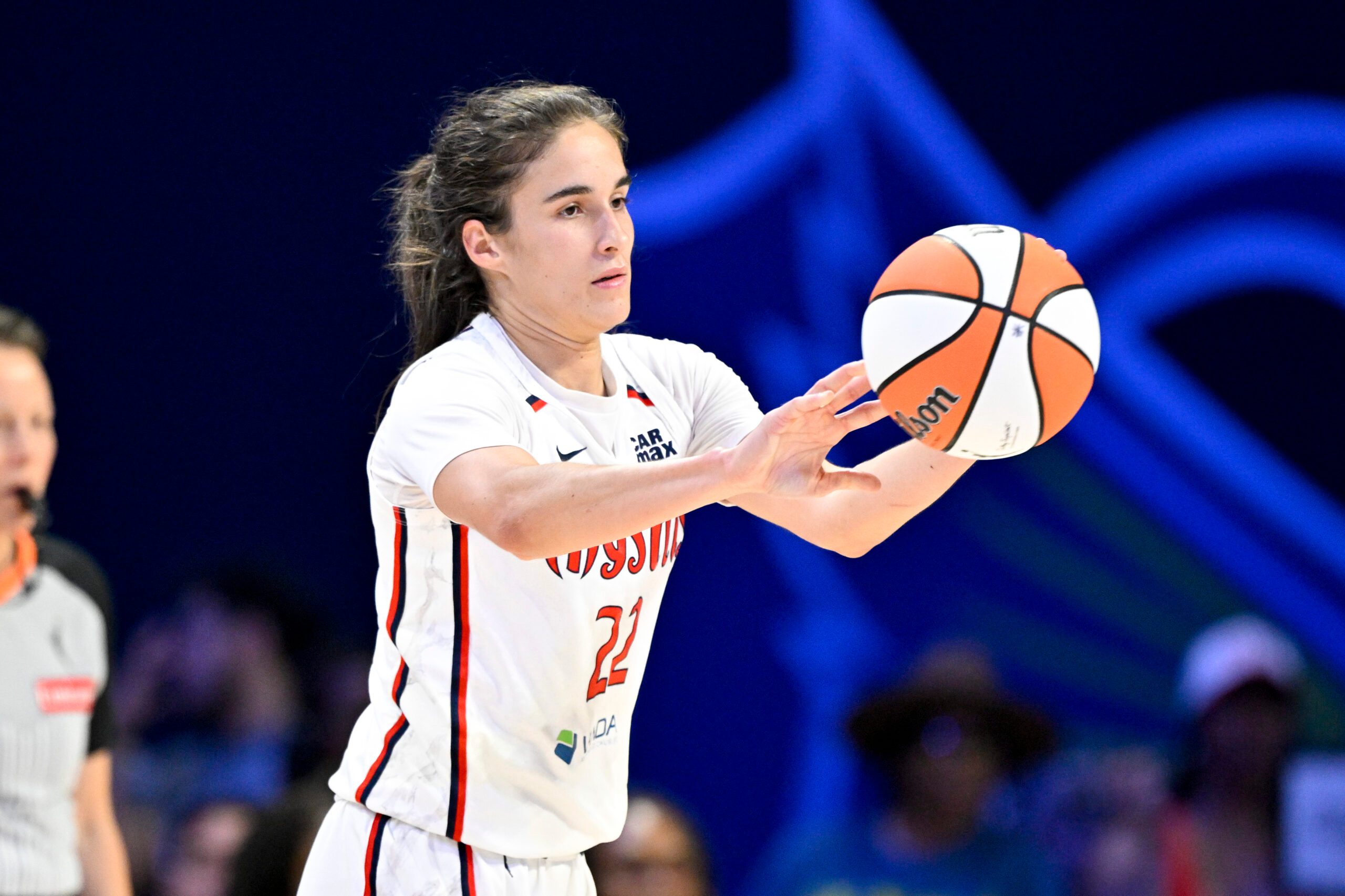 Jun 28, 2025; Arlington, Texas, USA; Washington Mystics guard Sonia Citron (22) passes the ball against the Dallas Wings during the second half at College Park Center. Mandatory Credit: Jerome Miron-Imagn Images