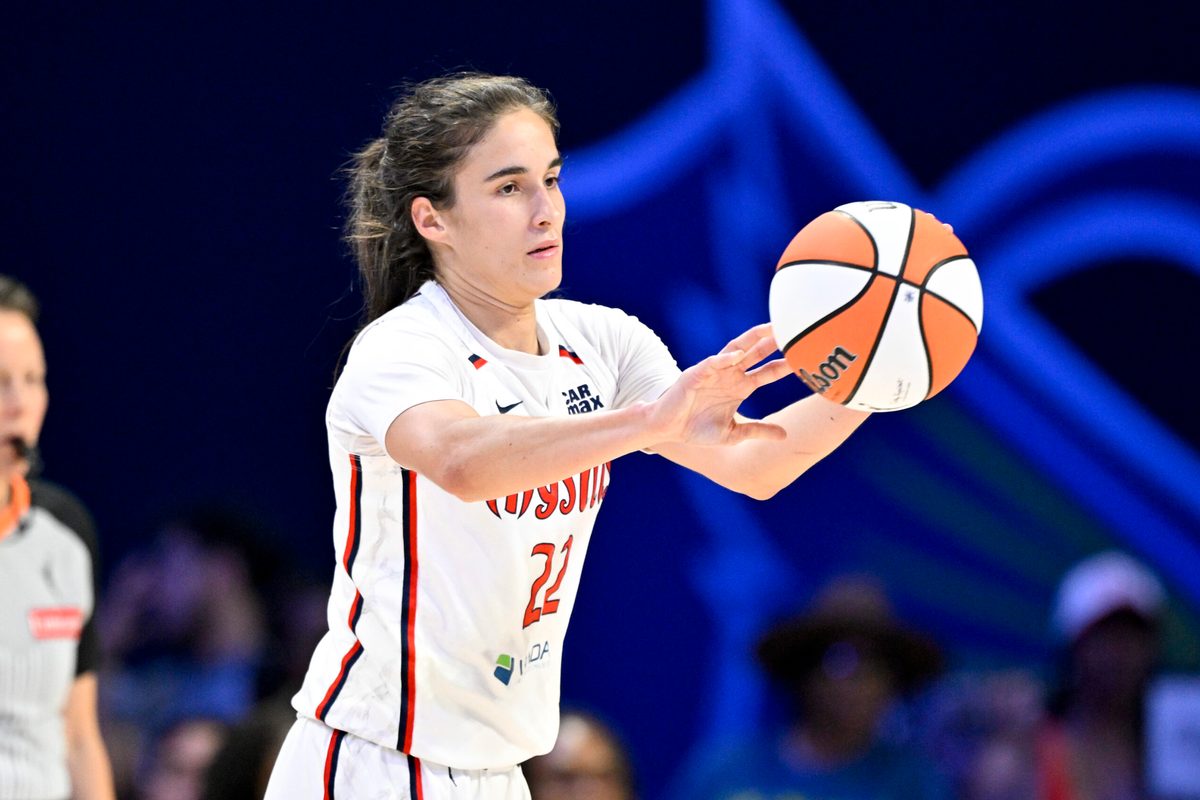 Jun 28, 2025; Arlington, Texas, USA; Washington Mystics guard Sonia Citron (22) passes the ball against the Dallas Wings during the second half at College Park Center. Mandatory Credit: Jerome Miron-Imagn Images