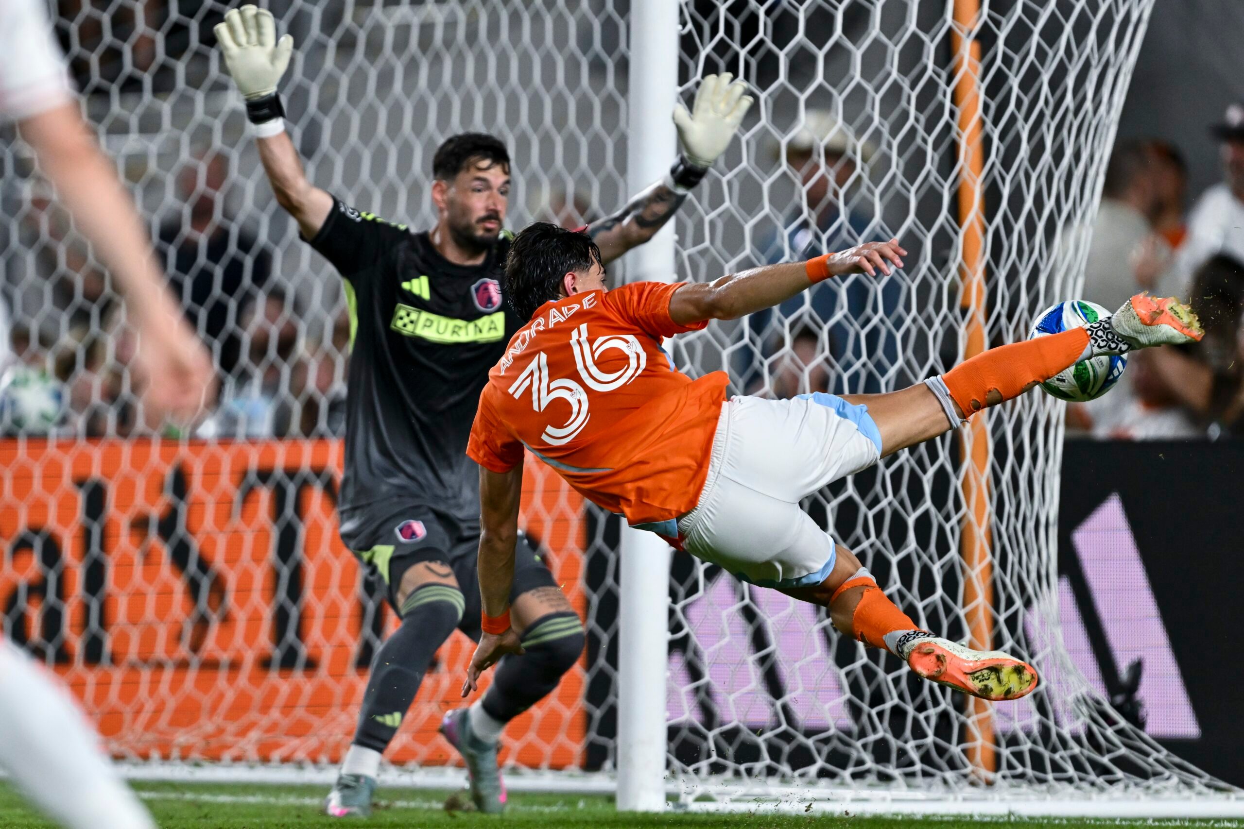 Jun 28, 2025; Houston, Texas, USA; Houston Dynamo defender Felipe Andrade (36) takes a shot on goal during the second half against the St. Louis City at Shell Energy Stadium. Mandatory Credit: Maria Lysaker-Imagn Images