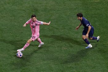 [Subscription Customers Only] Jun 29, 2025; Atlanta, Georgia, USA; Inter Miami FC forward Lionel Messi (10) kicks the ball past Paris Saint-Germain midfielder Fabian Ruiz (8) during a round of 16 match of the 2025 FIFA Club World Cup at Mercedes-Benz Stadium. Mandatory Credit: Amanda Perobelli-Reuters via Imagn Images