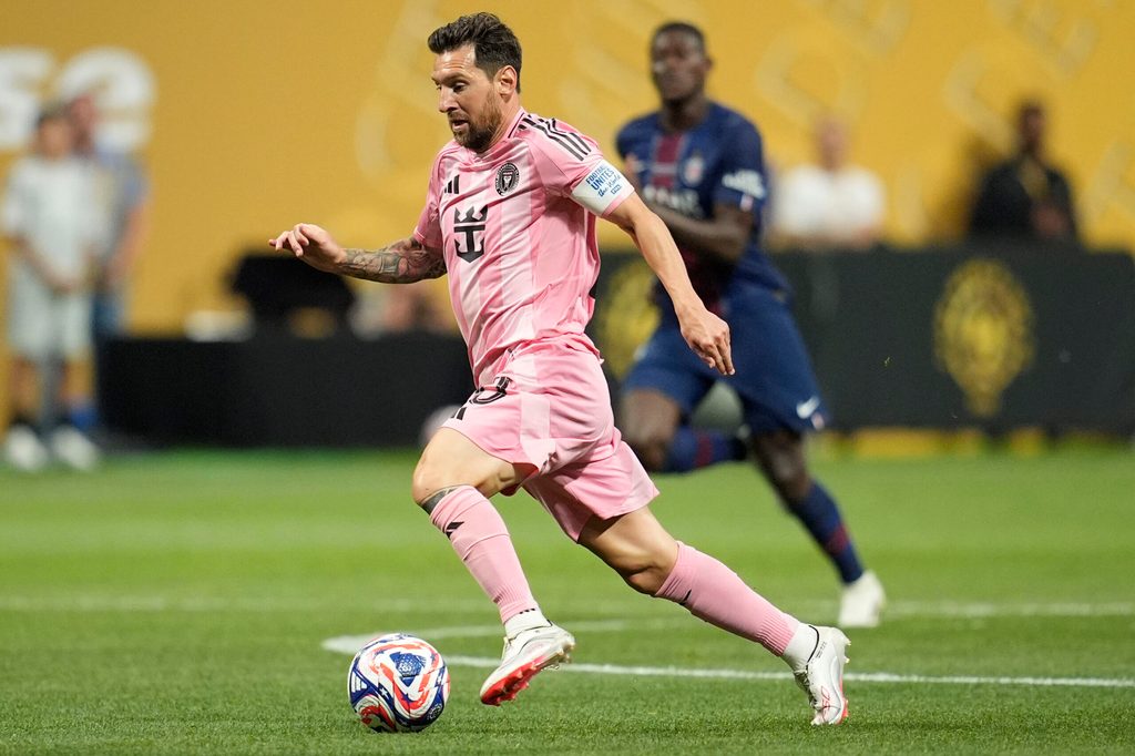 Jun 29, 2025; Atlanta, Georgia, USA; Inter Miami FC forward Lionel Messi (10) kicks the ball against the Paris Saint-Germain during a round of 16 match of the 2025 FIFA Club World Cup at Mercedes-Benz Stadium. Mandatory Credit: Dale Zanine-Imagn Images