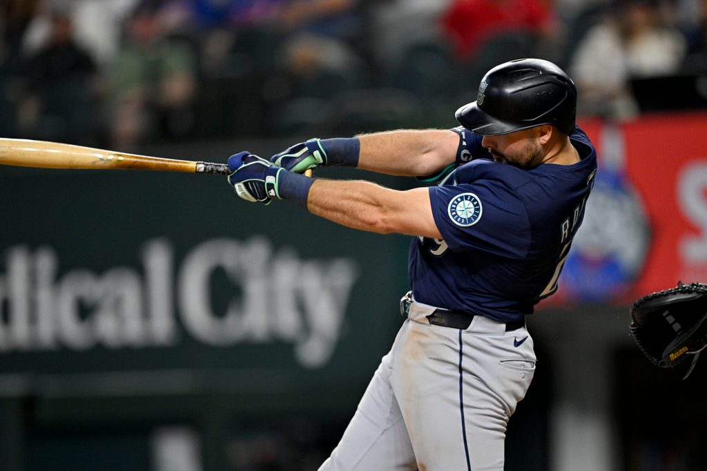 Jun 28, 2025; Arlington, Texas, USA; Seattle Mariners catcher Cal Raleigh (29) bats during the game between the Texas Rangers and the Seattle Mariners at Globe Life Field. Mandatory Credit: Jerome Miron-Imagn Images